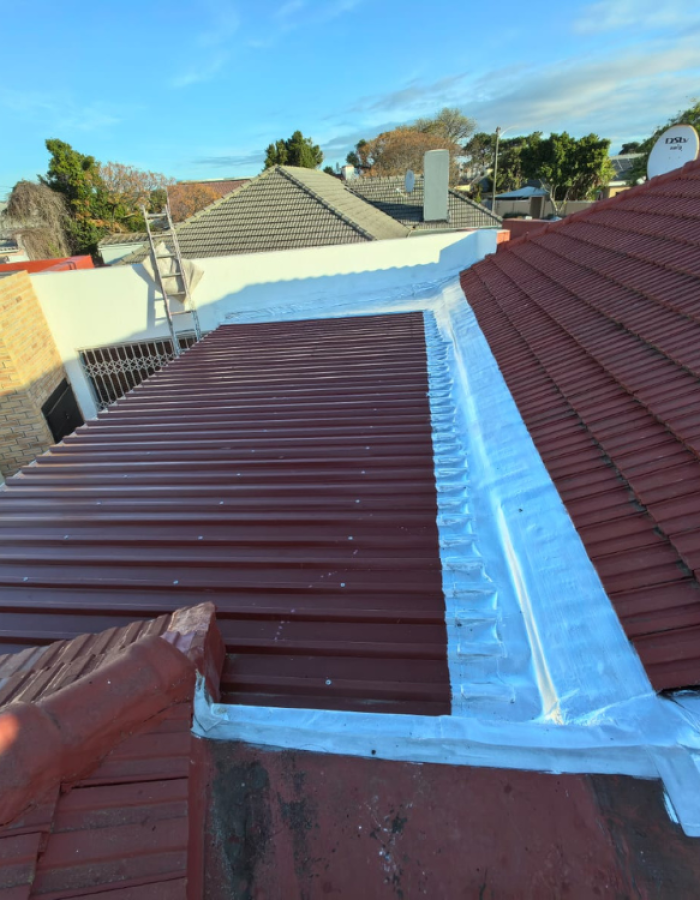 Rusted roof sheets replaced with new colour bond ultra roof sheets and waterproofed using torch on membrane,silver aluminum coating applied onto torch on membrane.