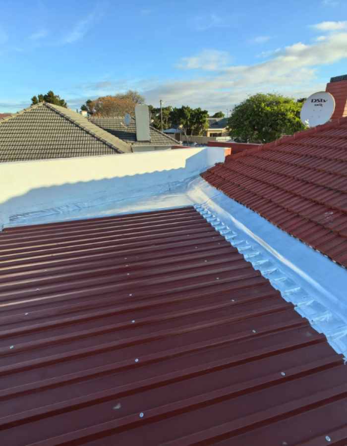 Rusted roof sheets replaced with new colour bond ultra roof sheets and waterproofed using torch on membrane,silver aluminum coating applied onto torch on membrane.