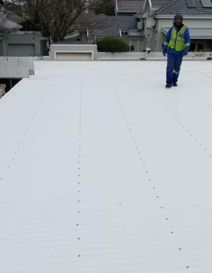 New roof sheet installation.